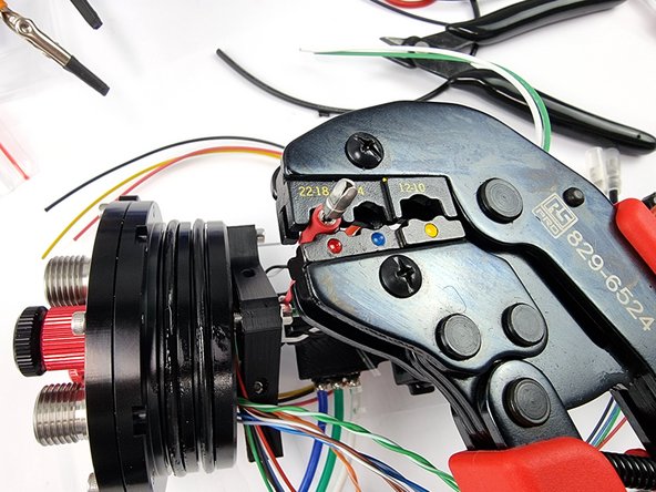 Once happy with the position of the bullet connector crimp it into place.