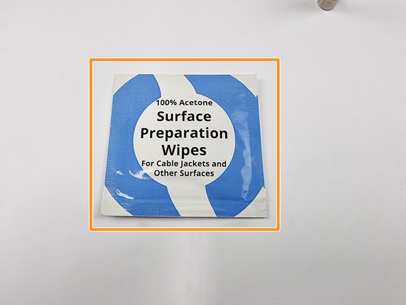 We need to roughen the inside of the connector shell to allow for better adhesion of the potting compound. Using a piece of sandpaper sand the inside of the connector shell.