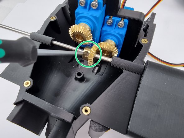 Now align the 4mm bevel gear with the bevel gear on the servo and fix into place with the set screw on the 4mm bevel gear.