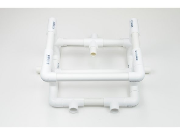 Take the three 40mm Pipe Section and insert them into the three open Tee Joints on in the base of the ROV frame.