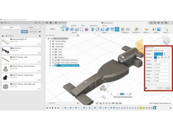 Insert an Axle Grommet into the assembly.