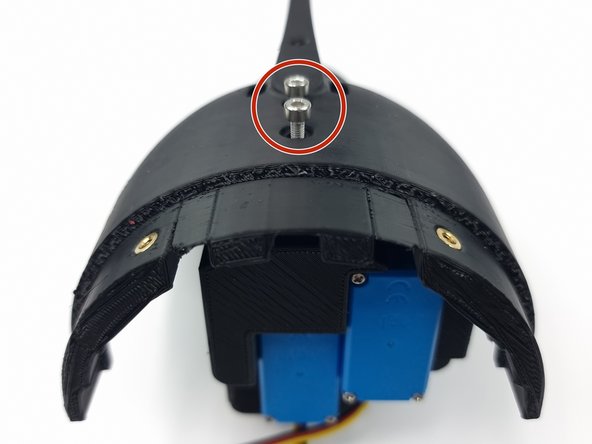 Once in place turn the cap upside down while holding it in place and insert the 2 screws to fix it into place