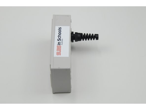 Loosely screw the stress relief (long) onto the larger threads.