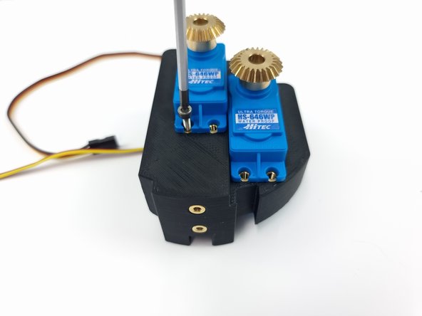Install the 4 screws for each servo