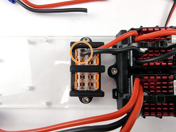 Insert the negative wire into the other Wago 221 connector