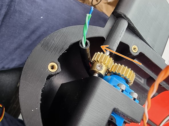 Feed the cable under the fore control surfaces shaft.