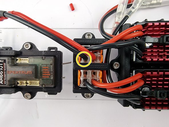 Strip the insulation from the end of the wire.