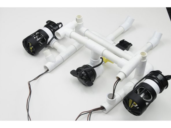 Push the wires through the hole, and work them through the frame of the ROV.