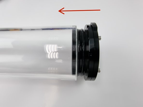 Ensure the inside of the acrylic tube is clean and insert the assembled end cap into the tube.