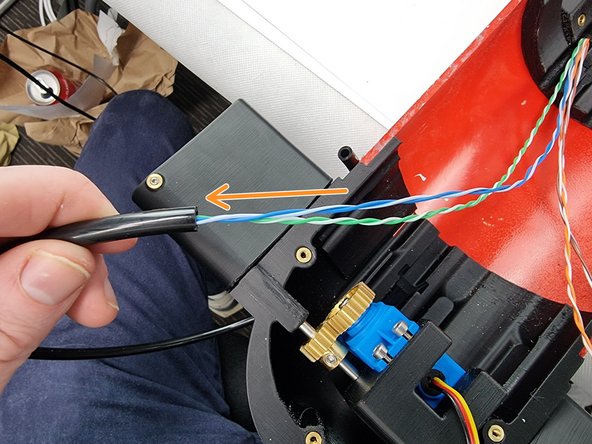 Trim the cable cover to length and slide it over the wires for the fore servo which are the blue,blue/white,green and green/white wires.