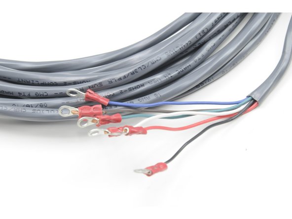 Cut the six terminal ring connectors from the end of the tether. Cut as closely to the terminal ring connector as possible to preserve the length of the tether.