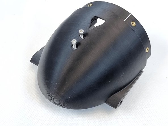 Flip the cap over and install 2 x M3  x 12mm socket head cap screws.