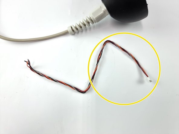 Find the left over wire from the Satellite receiver.