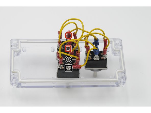 Set your multimeter to test resistance and place the red lead on one end of jumper one (red dot) and the black lead on the other end of jumper one (black dot).
