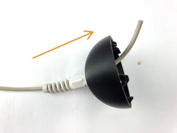 Feed the 4 core wire through the cable gland and tighten the nut on the cable gland to seal around the wire.