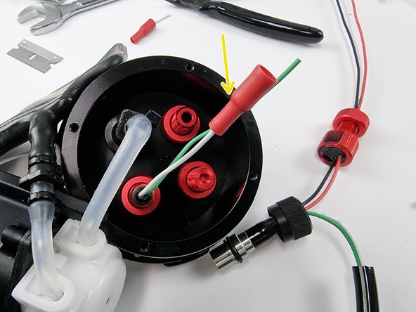 Slide a female bullet connector onto the white wire.