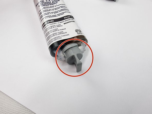 Twist the cap of the potting compound to remove it