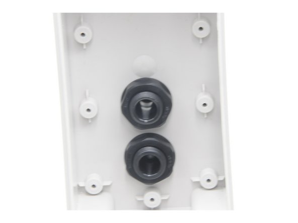 Screw the small nut onto the small threads until the bolt is tightly secured to the control box.