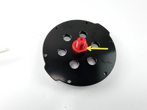 Screw on the nut on the backside of the penetrator blank