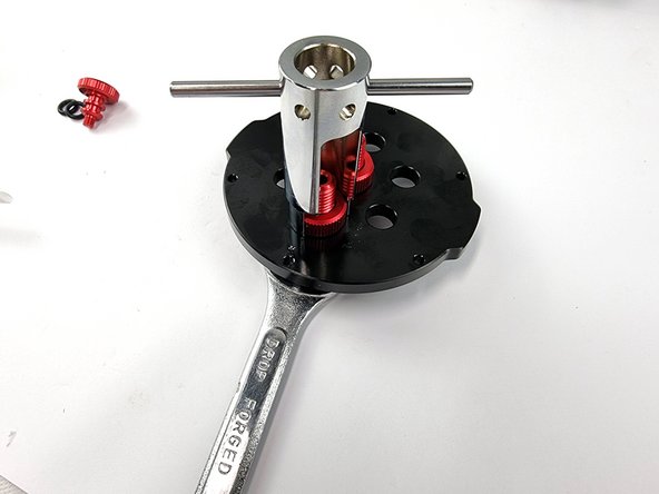 Install the nut on the back side and tighten with a spanner and penetrator wrench