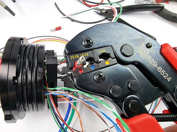 Ensure that the bare wire extends all the way into the connector so that the wires touch the metal stop you can see highlighted in the photo.