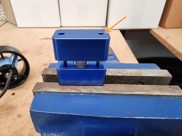 Slide the upper half of the Termination Tool onto the lower half of the Termination Tool. Insert the pins on the upper half of the Termination Tool into the sockets on the Connector Insert.