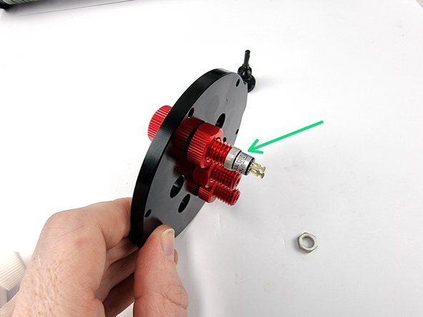 Screw the push button switch into the back of the power switch penetrator