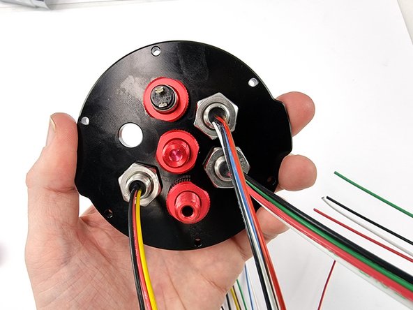 Install the nut on the back side of the bulkhead connector and tighten with the penetrator wrench and a 17mm spanner