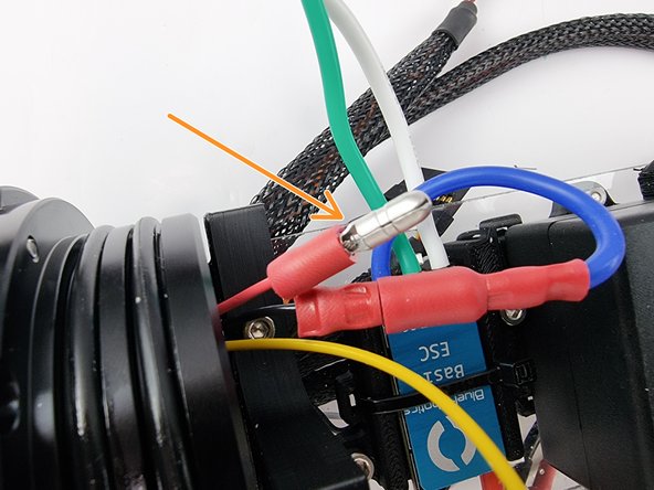 Slide a male bullet connector onto the wire and crimp it into place