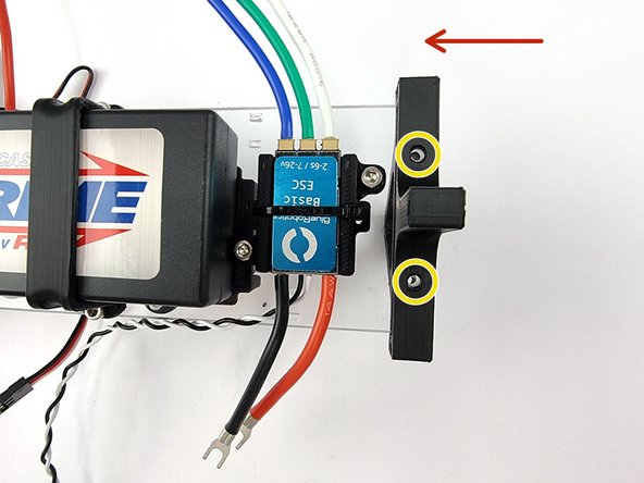 Slide it onto the end of the support plate with the triangle section to the top.
