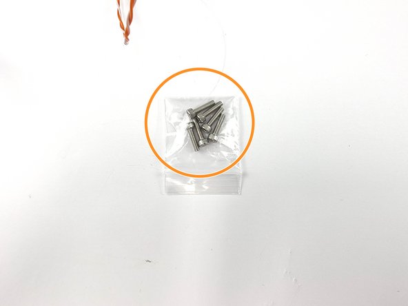 Grab the bag of screws that comes with the end cap.