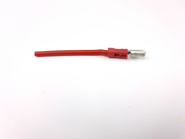 Crimp the connector onto the wire ensuring a tight connection.