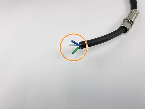 Strip the outside sheathing from the thruster cable.