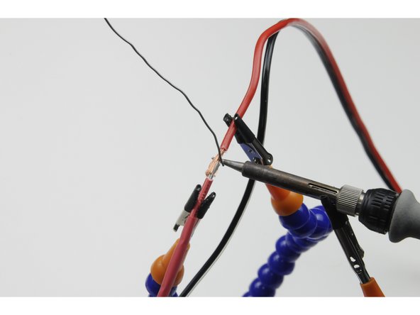 Exercise caution when using the soldering iron as it is extremely hot.