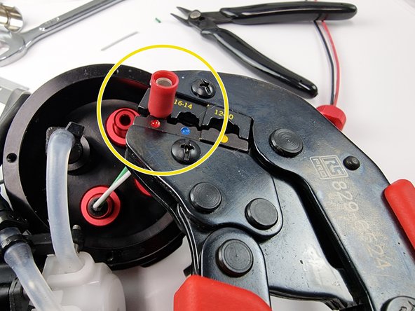 Ensure the wire is fully inserted into the female bullet connector and crimp the connector into place.