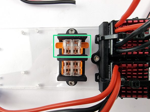 Pull out the 2 levers on the Wago 221 connectors as shown