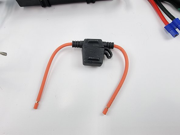 Next is to install the fuse holder on the battery positive line. This will protect the wiring and the battery from drawing too much power if something goes wrong.