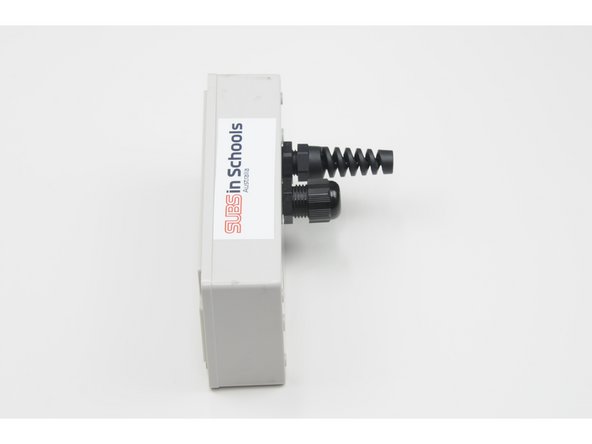 Loosely screw the stress relief (short) onto the larger threads.