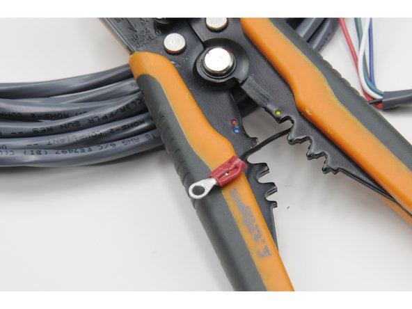 Use crimps to attach a red terminal crimp to the end of each of the six colored wires in the tether