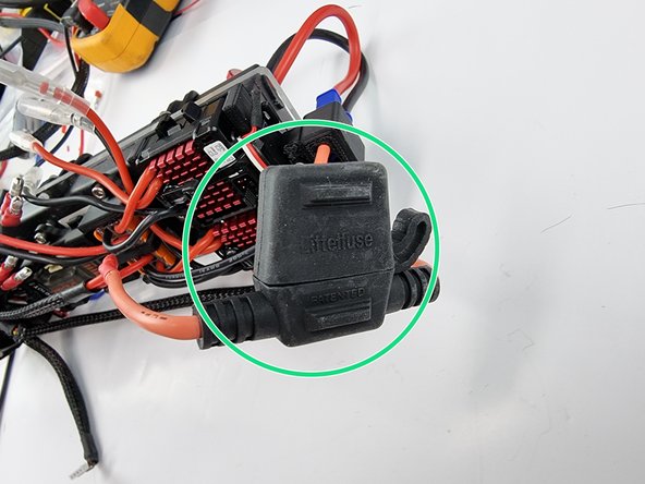 Close the cap on the fuse holder.