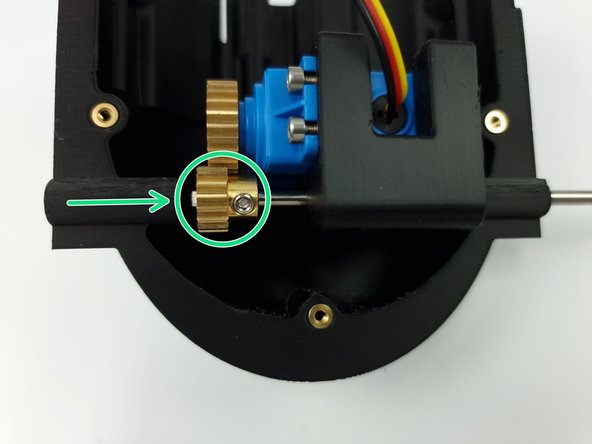 Slide the 4mm Pinion gear onto the control rod.