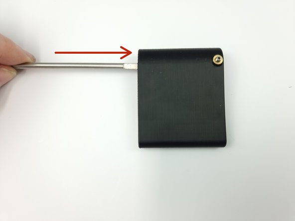 Install 1 of the control surfaces onto one end of the control rod.