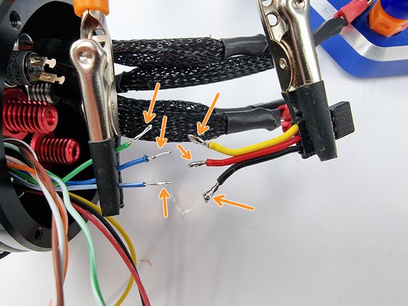 Tin the end of each wire with solder