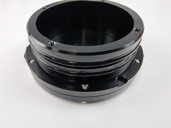 Lubricate the 2 thicker o-rings with a small amount of silicone grease.