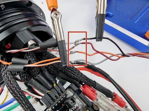 Before soldering the wires together cut strips of heat shrink and slide onto one side of the wires.