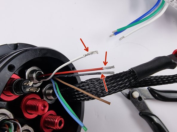 Once you have trimmed the wires we can strip the insulation from the end of the wires.