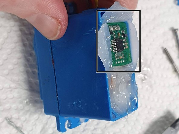 Carefully place the circuit board back into its original position.