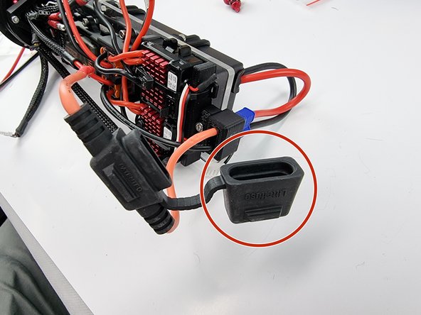 Open the cap on the fuse holder