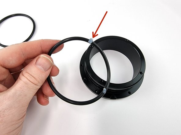 Apply a thin coat of silicone grease to the 2 thick o-rings.