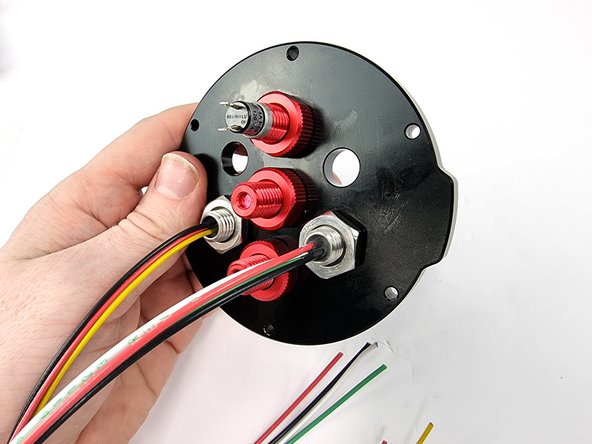 Install the nut on the back side of the bulkhead connector and tighten with the penetrator wrench and a 17mm spanner